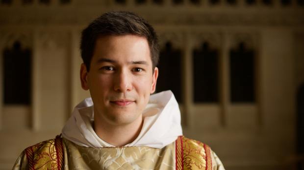 young priest in vestments