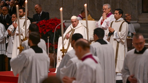 Pope Francis attends the Christmas Eve mass-AFP